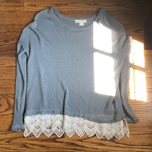 Grey sweater with crochet detail